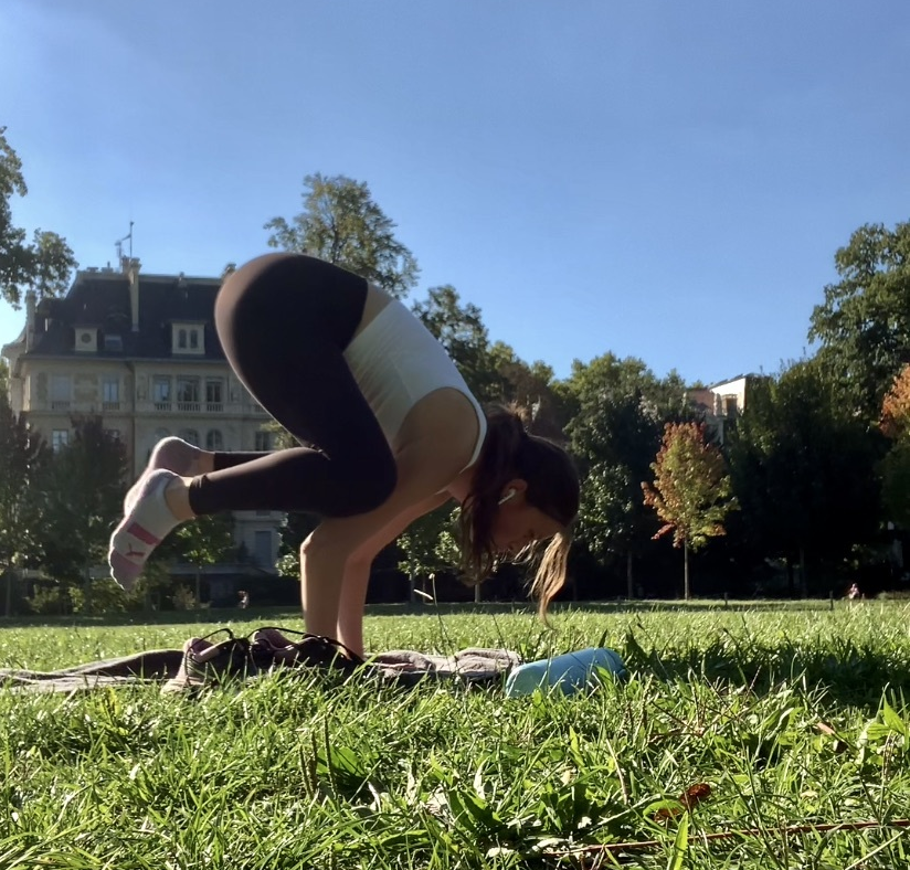 A female student doing a handstand
