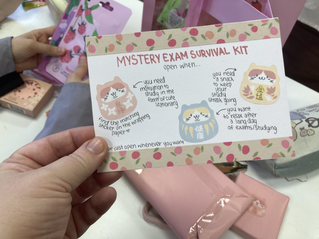 Card with "Mystery Exam Survival Kit" written on it