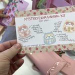 Card with "Mystery Exam Survival Kit" written on it