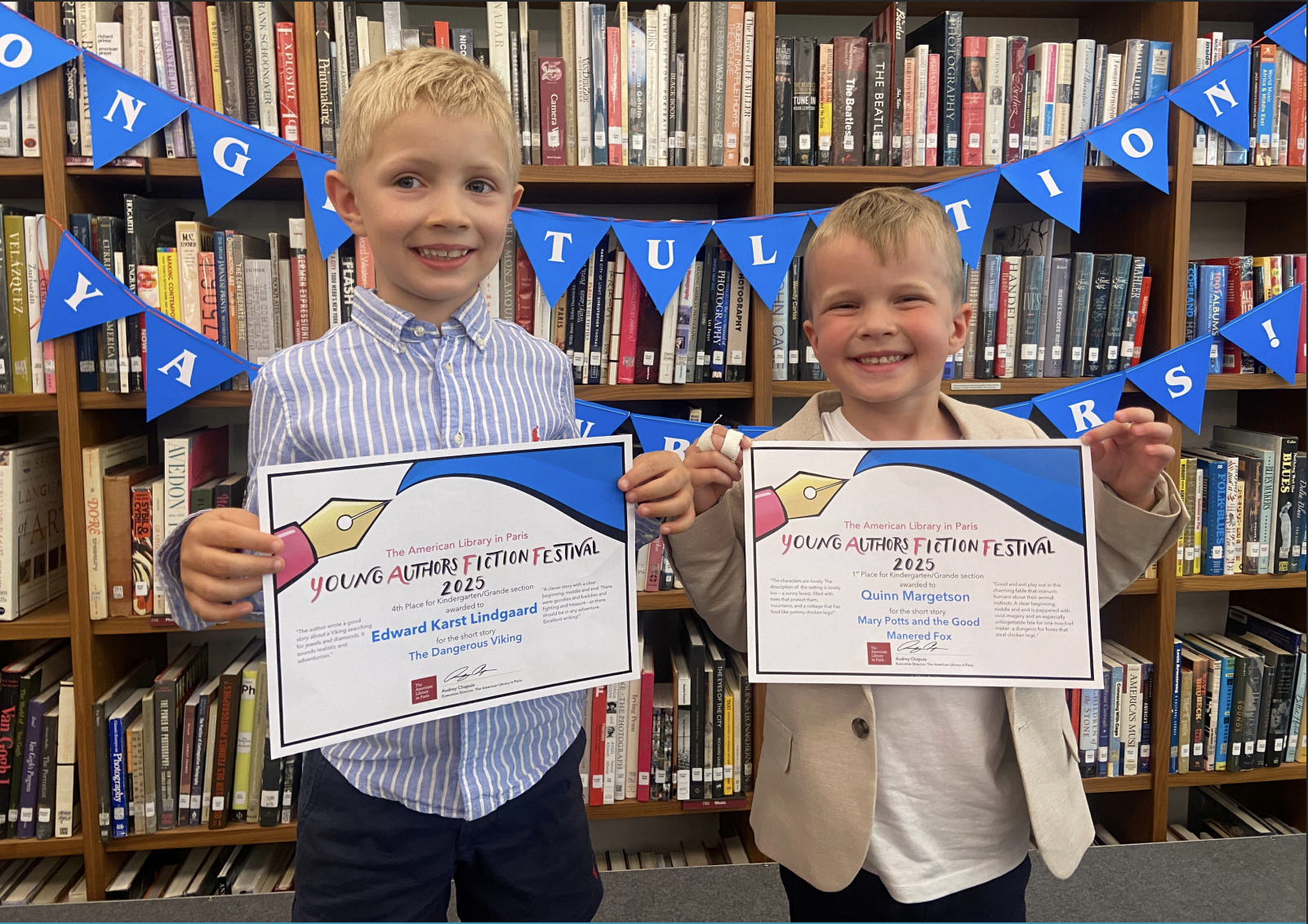 The winning students posing with their certificates
