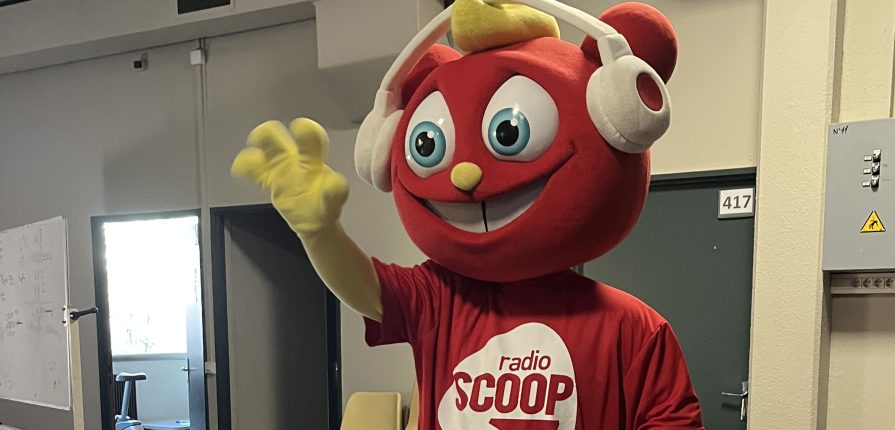 Radio Scoop's mascot Scoopy in the ISL assembly hall